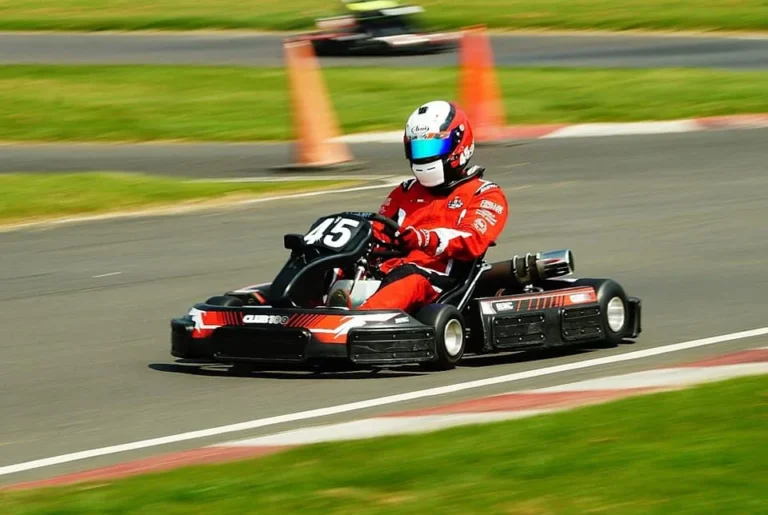 Kart number 45 racing past orange cones